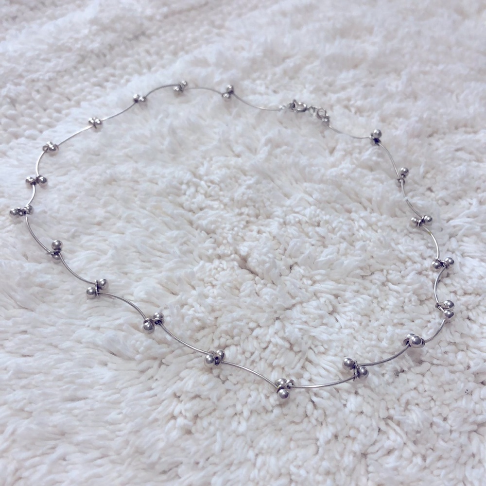 Silver segmented necklace; 16”